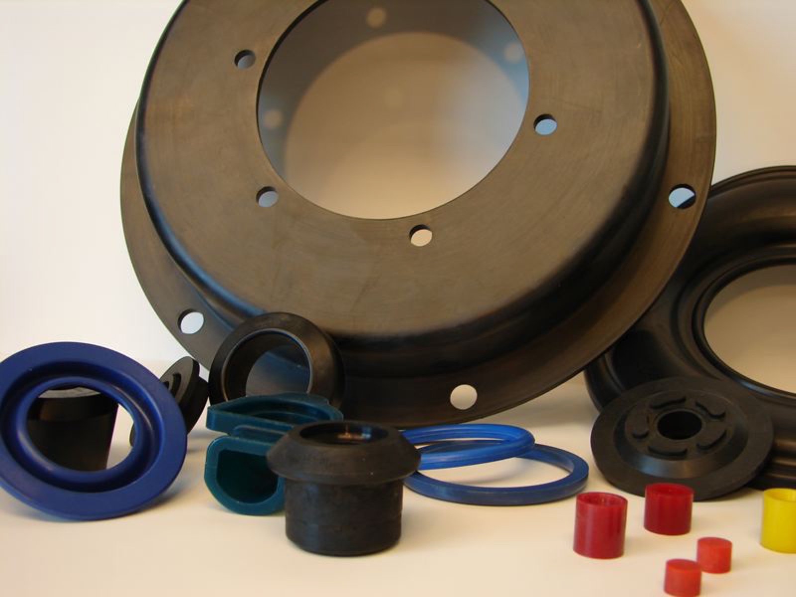 Custom molded rubber components in varied shapes and colors